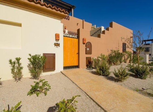 Club Campestre Pueblo Campestre Meticulously maintained 2 Bed | 2.5 Bath home located in the well sought out Pueblo Phase I community of Club Campestre San Jose. Spacious main-level living to large private patio area ready for entertaining, you won't be disappointed. Featuring two separate access points to the property, you can easily get to your assigned parking or the shared neighborhood pool/jacuzzi in a short moment. Updated paint throughout the interior/exterior, updated kitchen, outdoor BBQ. Sliding doors/screens throughout, private upstairs bedroom for guests with their own ensuite and rooftop pergola ocean – 31 Pueblo Campestre, San Jose del Cabo, BS