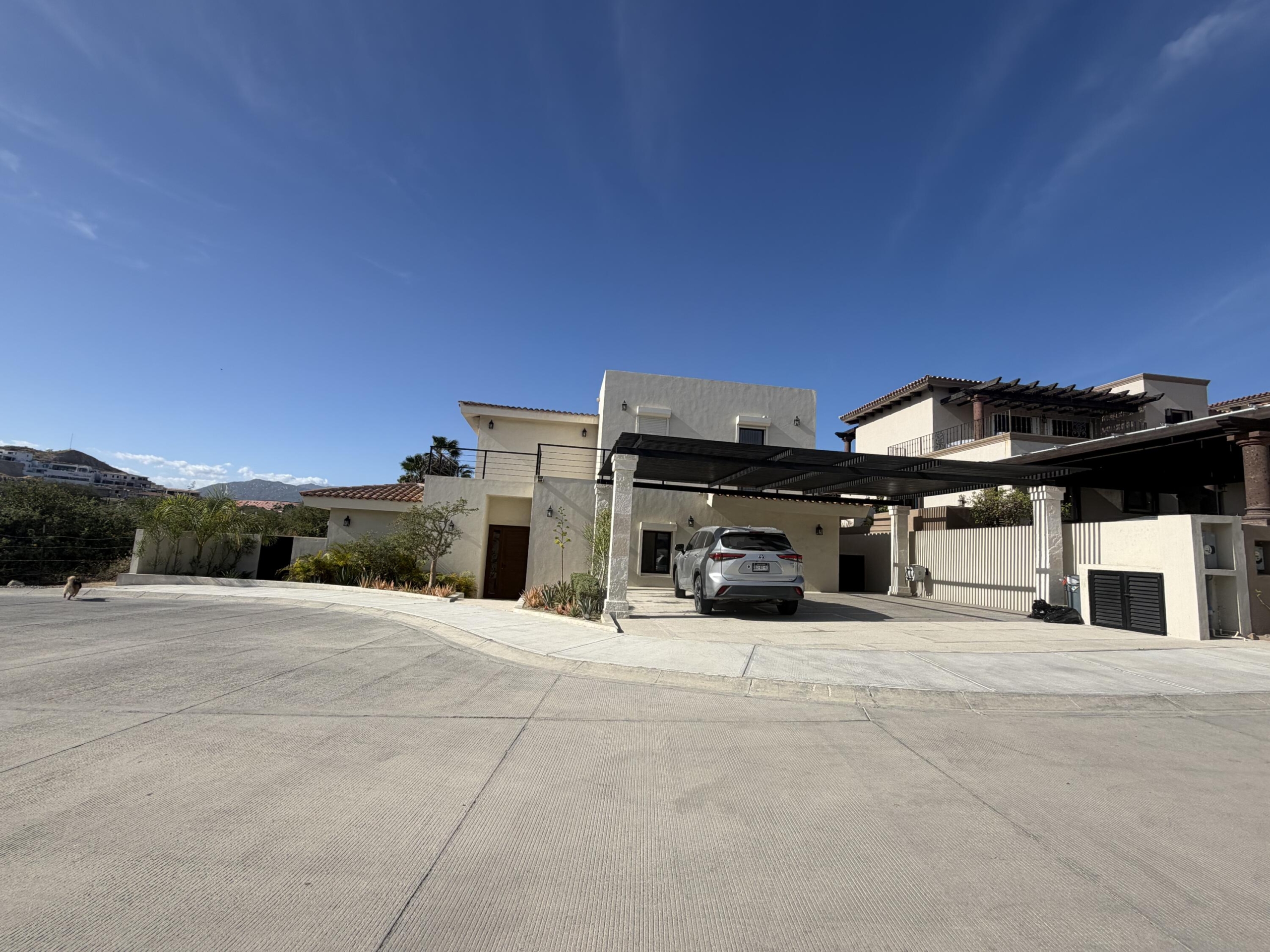 Club Campestre La Canada This luxurious residence showcases elegant contemporary architecture, enhanced by breathtaking for sale