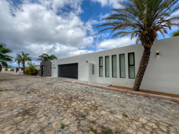 Club Campestre General Discover a unique opportunity to own a beautifully designed property in Loreto that blends comfort, functionality, and modern Spanish-style charm.This thoughtfully crafted home features one full bedroom and one full bathroom inside the main house, offering a cozy yet elegant living space. The property also includes a separate shop area with its own half bathroom, making it ideal for a home business, studio, or workshop.Designed with a modern Spanish architectural style, the home showcases clean lines, warm textures, and timeless character throughout. The outdoor shower adds a refreshing and practical touch--perfect for enjoying Loreto's coastal lifestyle. – Lote H Carretera Highway 19, KM 93, Pacific, BS
