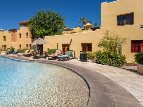 Club Campestre La Ventana GET TWO LOTS with this COMBINATION! Ideal for families, GROUPS, INVESTORS seeking rental or BUSINESS OPPORTUNITY! Sustainable construction Commune of Rammed Earth Homes has FOUR PRIVATE SUITES, two of which have kitchens, within two independent rammed earth homes. Enjoy shared amenities like SWIMMING POOL and fire pit area for outdoor enjoyment.Each unit features private entrances and quiet, comfortable interiors with kitchens and ensuite bathrooms. Rooftop terraces offer ocean – Mision de Loreto, Loreto, BS