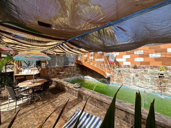 Club Campestre El Sargento A space you'll instantly fall in love with--Casa Amor is a striking Moroccan-inspired architectural retreat designed as a private, resort-style experience. Now offered at an exceptional value. This is not a conventional home, but a bold, multi-level, open-concept villa with soaring ceilings, dramatic arches, accordion glass walls, expansive terraces, and a resort-style pool patio, open air design stepping out to the heated lap pool. Flexible four-level layout with two living areas and two kitchens supports a couple, extended family, or duplex-style. Sleeps 2-10 with gym, garage, owner lock-off, storage, and three glamping tents. Direct access to trails above Rasta Beach, minutes to town. Established, proven rental income with professional marketing team in place. Priced to sell! – Mza.11 L.7 San Jose Viejo, San Jose del Cabo, BS
