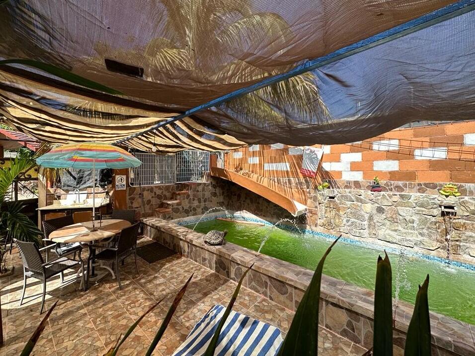 Club Campestre El Sargento A space you'll instantly fall in love with--Casa Amor is a striking Moroccan-inspired architectural retreat designed as a private, resort-style experience. Now offered at an exceptional value. This is not a conventional home, but a bold, multi-level, open-concept villa with soaring ceilings, dramatic arches, accordion glass walls, expansive terraces, and a resort-style pool patio, open air design stepping out to the heated lap pool. Flexible four-level layout with two living areas and two kitchens supports a couple, extended family, or duplex-style. Sleeps 2-10 with gym, garage, owner lock-off, storage, and three glamping tents. Direct access to trails above Rasta Beach, minutes to town. Established, proven rental income with professional marketing team in place. Priced to sell! – Mza.11 L.7 San Jose Viejo, San Jose del Cabo, BS
